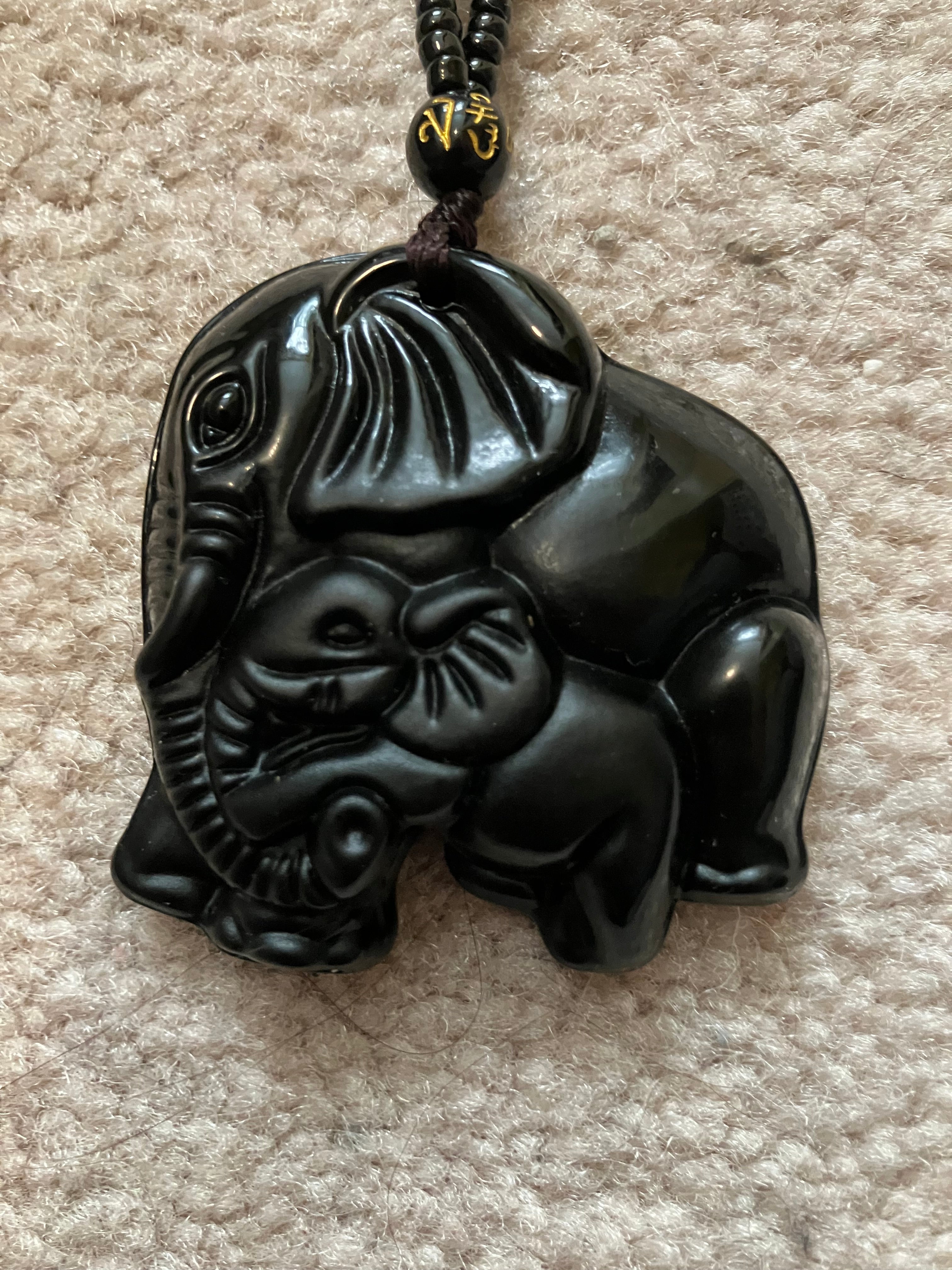 Black elephant necklace